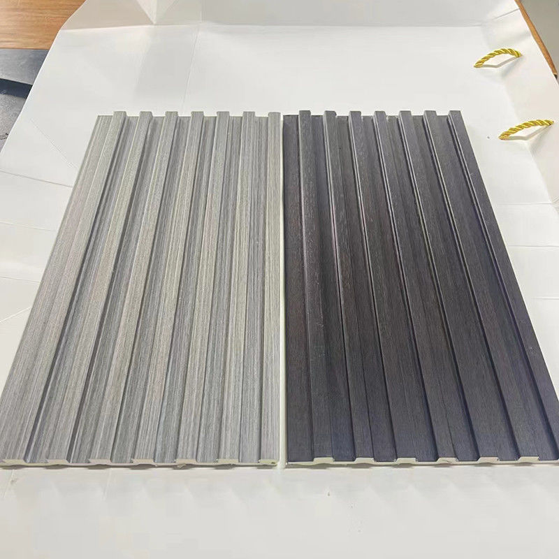 Προσαρμοσμένο WPC Fiber Grating Groove επιφάνεια Ανερό αδιάβροχο πυρόστακτο τοίχωμα για διακόσμηση σπιτιού